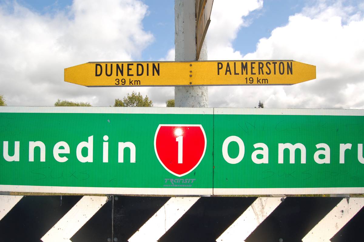 dunedin to plamerston street sign dunedin to plamerston street sign