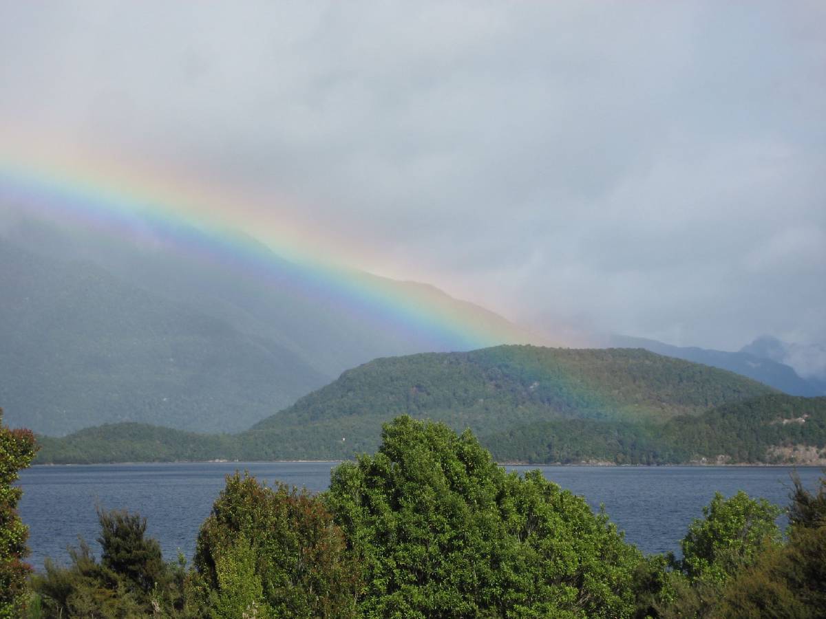 rainbow at lake manapouri rainbow at lake manapouri